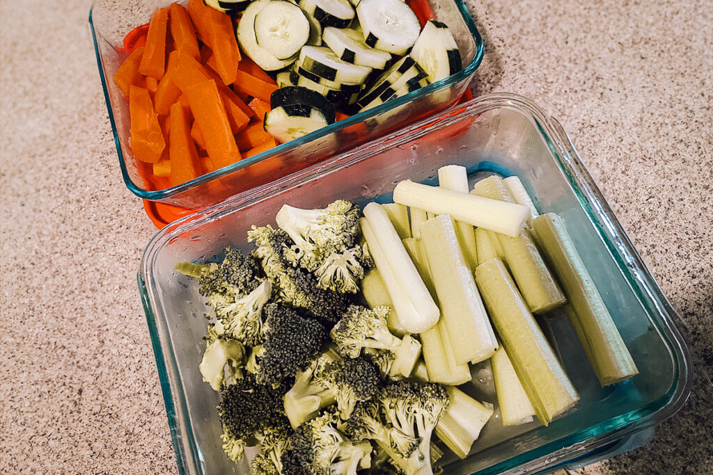 Two containers of vegetables