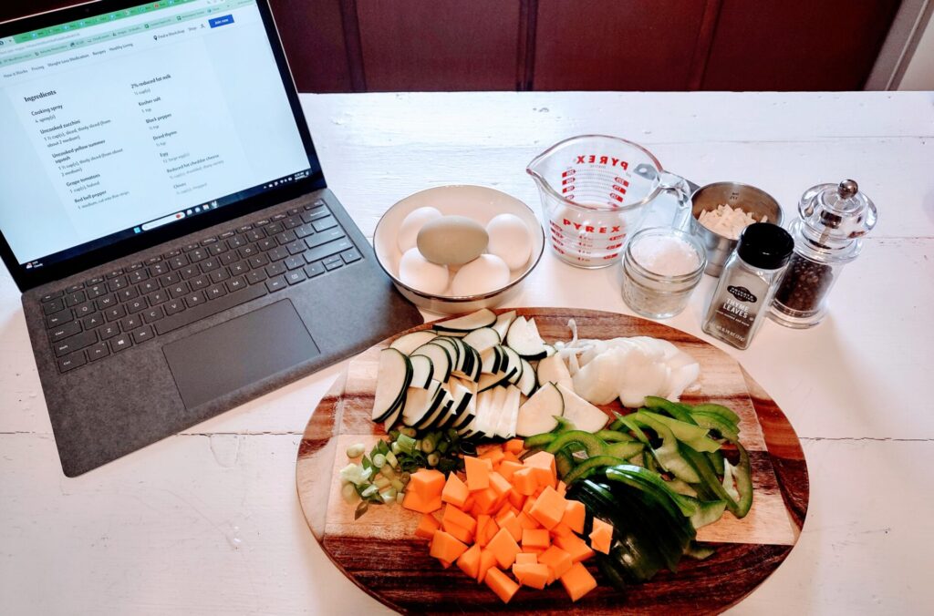 Ingredients and a computer on a table